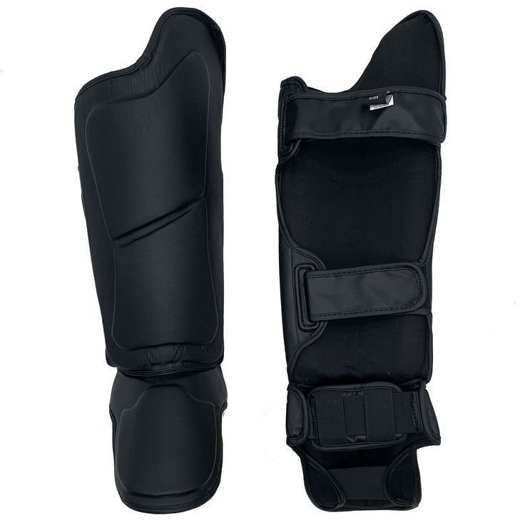 WhatsApp Image 2025-11-26 at 12.17.51 AM (3) shin guards, mma shin guards, kickboxing shin pads, muay thai shin guards, martial arts protective gear, taekwondo shin guard, mma equipment, fightwear manufacturer sialkot, protective shin pads, custom shin guards, wholesale martial arts gear, leather shin guards, padded shin protectors, ahmaam sports shin guards, martial arts exporter pakistan, private label shin guards, sialkot mma supplier, eva foam shin guards, kids shin guards, professional shin guards