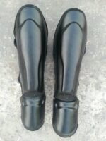 shin guards, mma shin guards, kickboxing shin pads, muay thai shin guards, martial arts protective gear, taekwondo shin guard, mma equipment, fightwear manufacturer sialkot, protective shin pads, custom shin guards, wholesale martial arts gear, leather shin guards, padded shin protectors, ahmaam sports shin guards, martial arts exporter pakistan, private label shin guards, sialkot mma supplier, eva foam shin guards, kids shin guards, professional shin guards